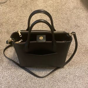 Black “A New Day” purse